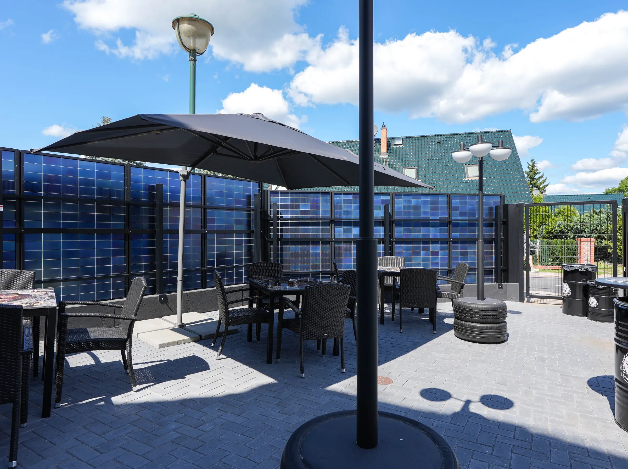 The terrace of the Silberwolf Biker Bar with seating in front of the house
